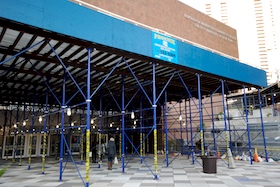 Scaffolding surrounding the main entrance to BMCC at 199 Chambers